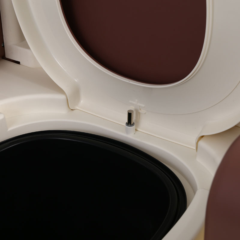 Foldable household commode chair for the elderly and disabled